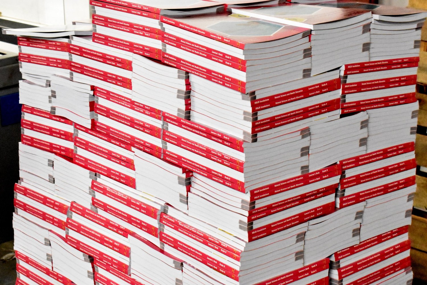 Book blocks being prepared for binding