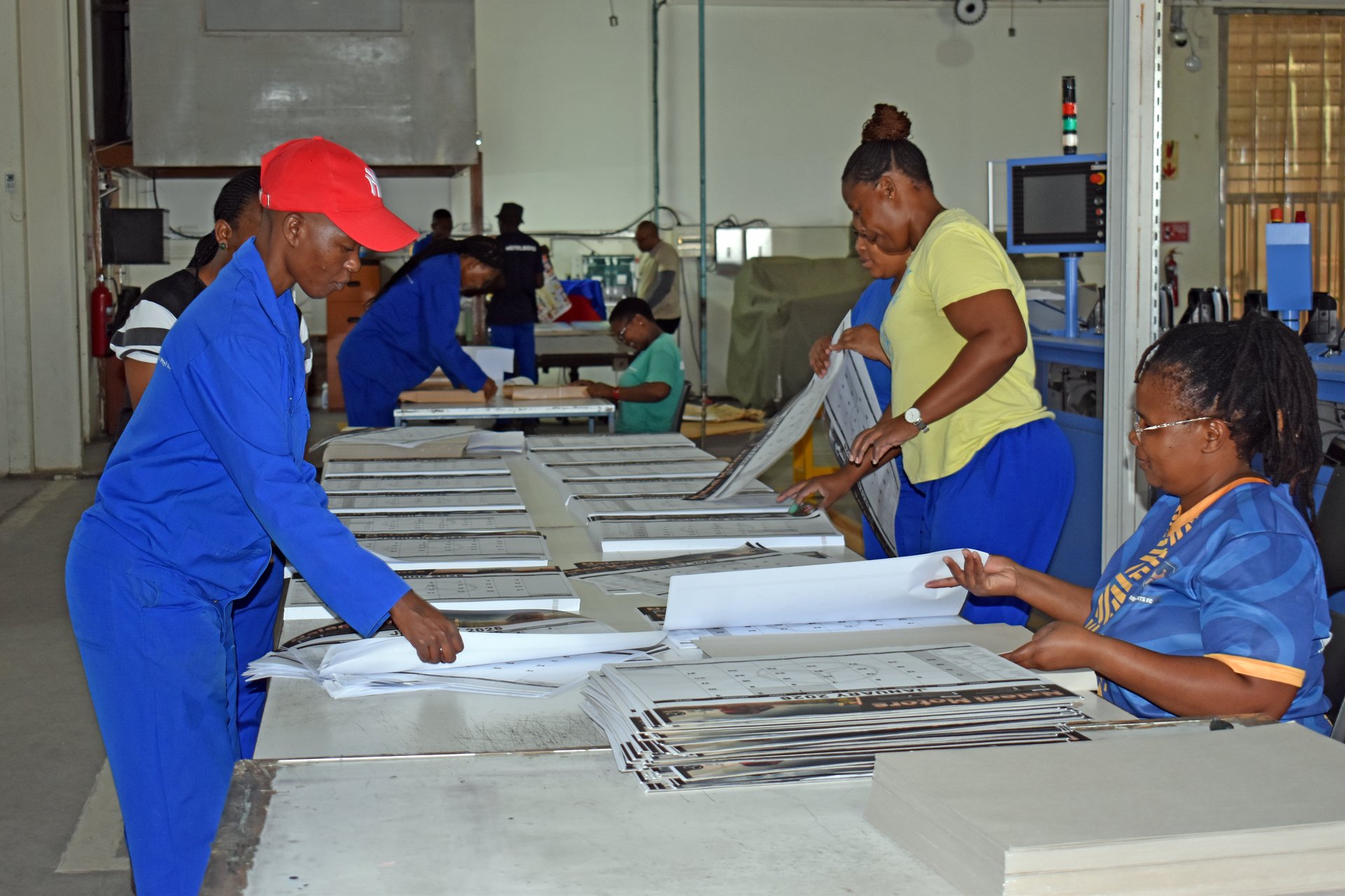 Operator running a folding machine