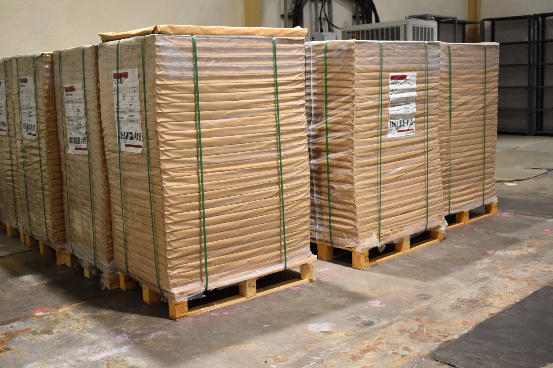 Stacked reams of paper ready for the pressroom